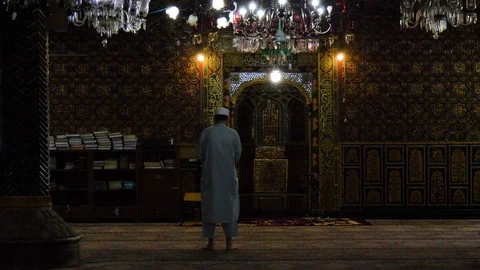 Praying in a mosque Stock Footage 128239920