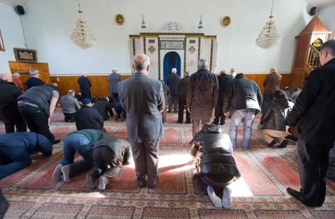 Praying in mosque Foto stock