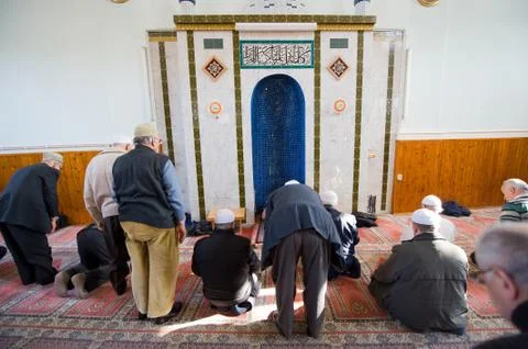 Praying in mosque Stock Photos