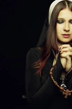 Praying  nun Stock Photos