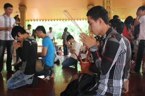Praying people Stock Photos