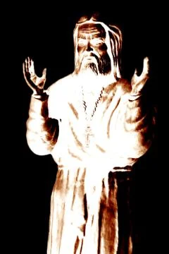 Praying priest Stock Photos