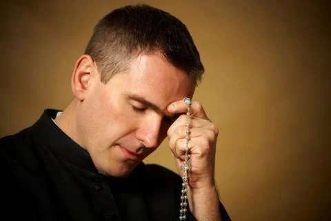 Praying priest 스톡 사진
