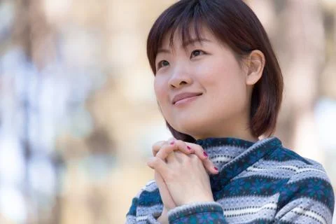 Praying in winter Stock Photos