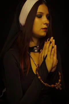 Praying woman Stock Photos