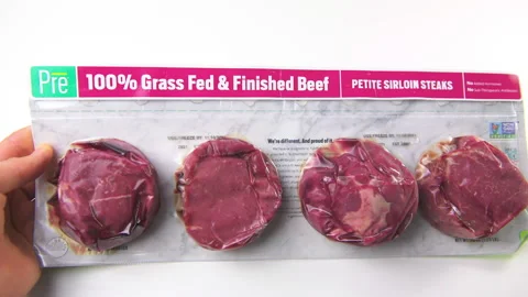 Pre brand of grass fed finished beef petite sirloin steaks bought at Costco Video stock 169348268