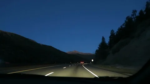 Pre dawn drive on alpine freeway. Stock Footage 97429069