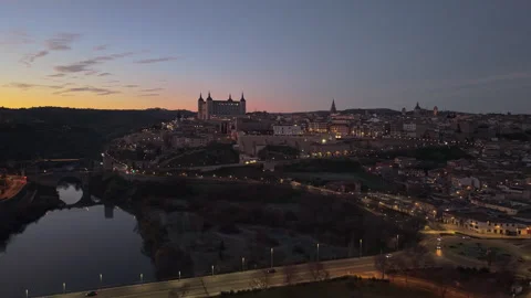 Pre-Dawn Shot of the Bridge over the Tagus River and Illuminated City of Toledo Stock Footage 317157076