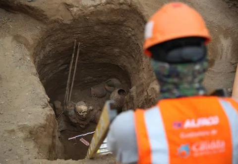 Pre-Hispanic burial uncovered during installation works of natural gas pipeline  Stock Photos