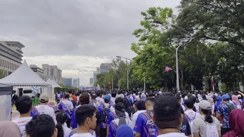 Pre-Race Excitement | Runners Preparing for Putrajaya Marathon 2024 in 4K Stock Footage 303699751