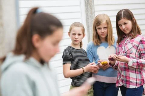 Pre Teen Girl Being Bullied By Text Message Stock Photos