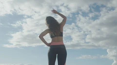 Pre-workout stretch. Yoga stretching. Warm-up. Side reach Stock Footage 108471215
