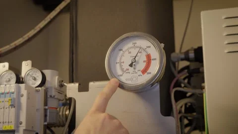 Preassure valve being inspected Stock Footage 300709329