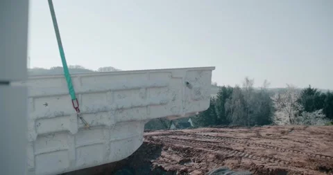 Precast concrete panel hanging from crane straps over, construction Vídeos de archivo 342515832