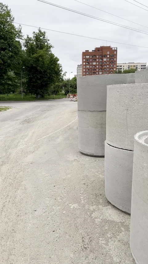 Precast Concrete Rings Stored at Infrastructure Construction Site Stock Footage 341569210