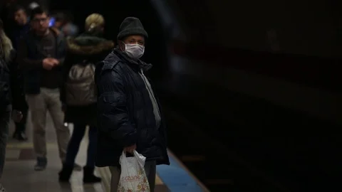 The precaution people take against Coronavirus in Istanbul Metro. Video stock 126312657