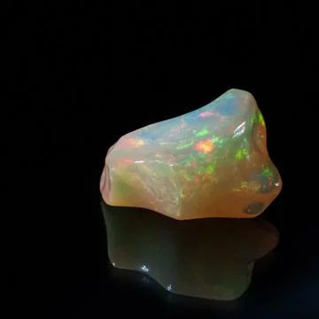 Precious opal. Gemological sample, no cut.Very bright unique sample is photog Stockfoto's