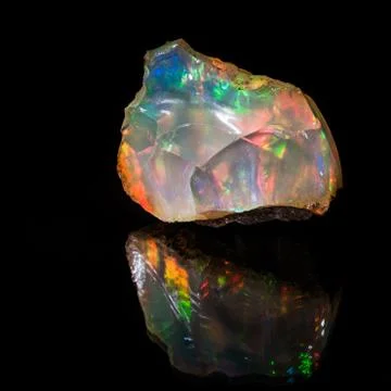 Precious opal. Gemological sample, no cut.Very bright unique sample is photog Stockfoto's