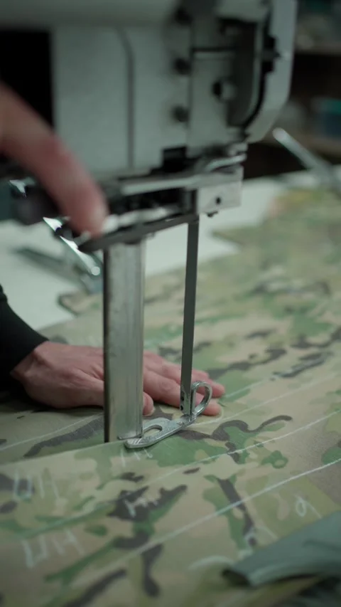 Precise cutting of fabric with industrial tools. Clothing modeling concept. Stock Footage 293152247