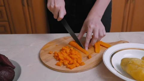 Precise Knife Handling Produces Consistent Carrot Sticks For Presentation Stock Footage 328496407