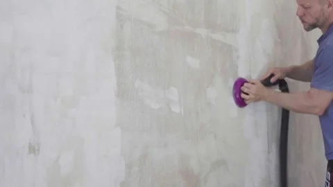 Precise surface preparation involving vacuum assisted sanding of upper walls Stock Footage 330417270