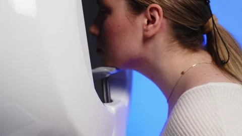 Precise visual field testing using an automatic computer perimeter Stock Footage 256759444