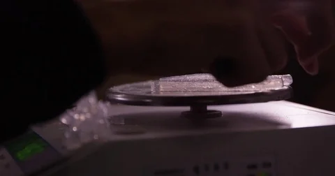 Precisely Weighing Silicone Rubber Sticks Stock Footage 73076790