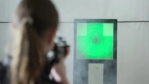 Precision and focus shine during thrilling target practice at a shooting range Video stock 308313851