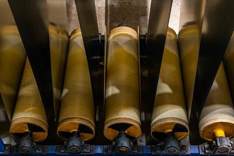 Precision and Progress: Coating Metal Rolls in a Russian Industrial Facility Stock Photos