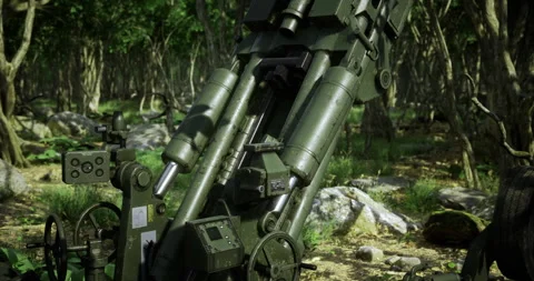 Precision artillery piece concealed in a lush, forested environment Stock Footage 318419838