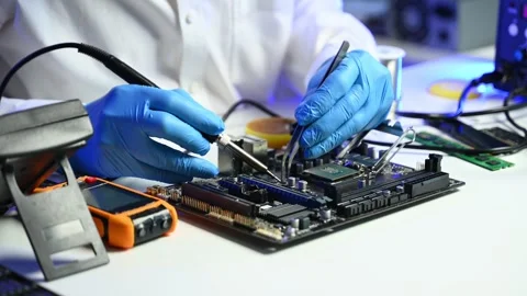 Precision closeup of soldering a circuit board. Ideal for themes on electro.. Stock Footage 312773791