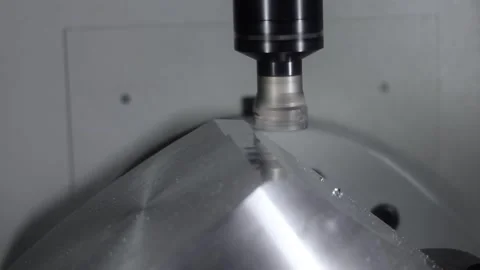 Precision cnc milling machine cutting metal part in slow motion industrial .. Stock Footage 337349830