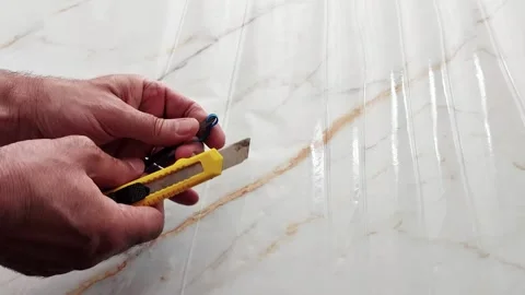 Precision Cut: Utility Knife Slices Plastic Tie Cleanly Video stock 311431646