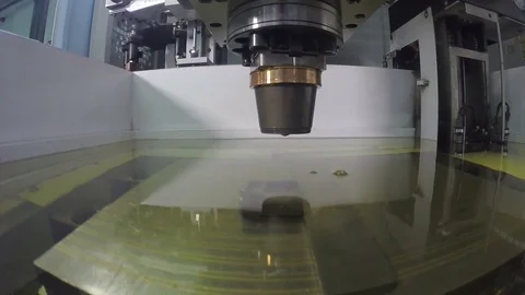 Precision cutting of metal parts using an Electrical discharge machine Stock Footage 81914839