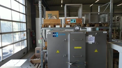 Precision drone move over industrial filter equipment inside warehouse Stock Footage 331884793