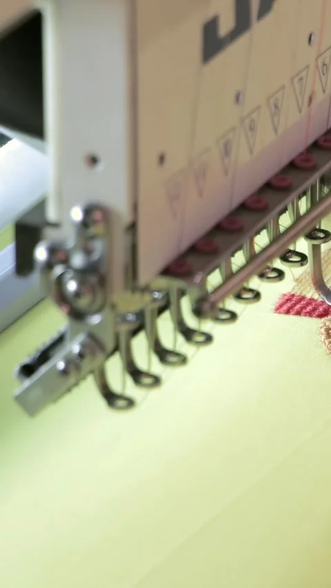 Precision Embroidery Machine Creates Stunning Textile Artwork Stock Footage 344617946