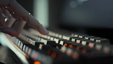 With precision-engineered fingers a humanoid cyborgs robotic hand hovers ove Stock Footage 331866064