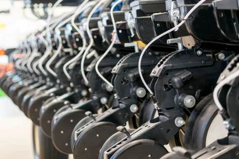 Precision inline seeder. A row seeder. Seed drill. Fragment. Stock Photos