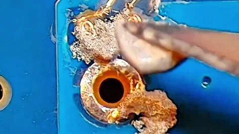 Precision Jumper Wire Repair on Smartphone Motherboard Stock Footage 333610564