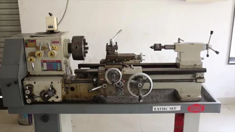 Precision Lathe Machine in Industrial Workshop for Metal Turning Stock Footage 332143715