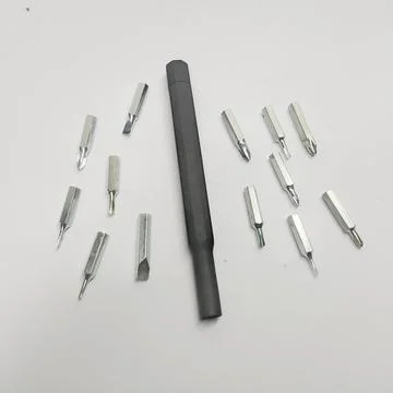 Precision Magnetic Screwdriver Bit Set with Slim Black Handle for Electronics Stock Photos