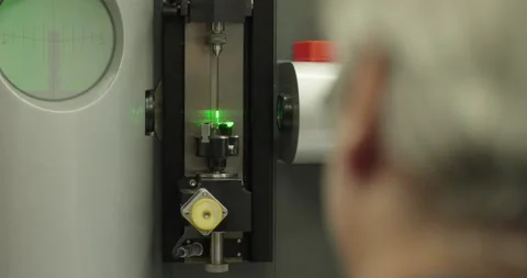 Precision Measuring Machine Inspecting Metal Part Stock Footage 340855952