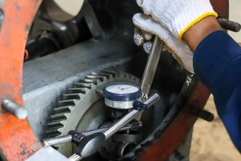 Precision Mechanical Component Adjustment and Measurement. Stock Photos