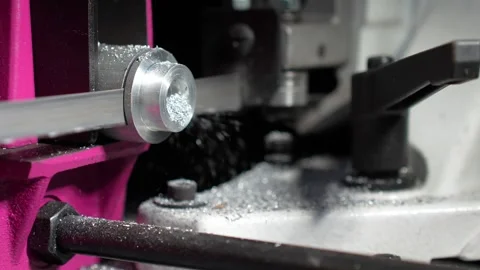 Precision metalworking: CNC lathe in operation Stock Footage 256235363