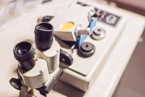 Precision micrometer grinder polishing machine with an optical microscope sta Stock Photos