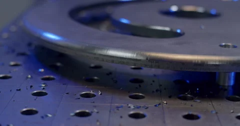 Precision milled circular metal component with smooth beveled edge on CNC table Video stock 329475899