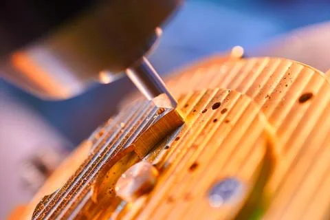 Precision milling in the manufacturing process of clockwork mechanisms in a Stock Photos