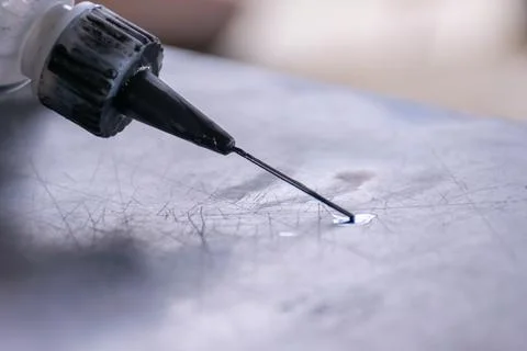 Precision Needle Applying Liquid Adhesive Stock Photos