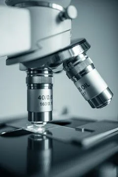 Precision optical microscope in clean laboratory Stock Photos