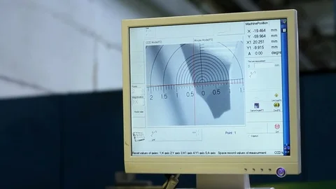Precision part processing under a video microscope Stockbeeldmateriaal 75545798
